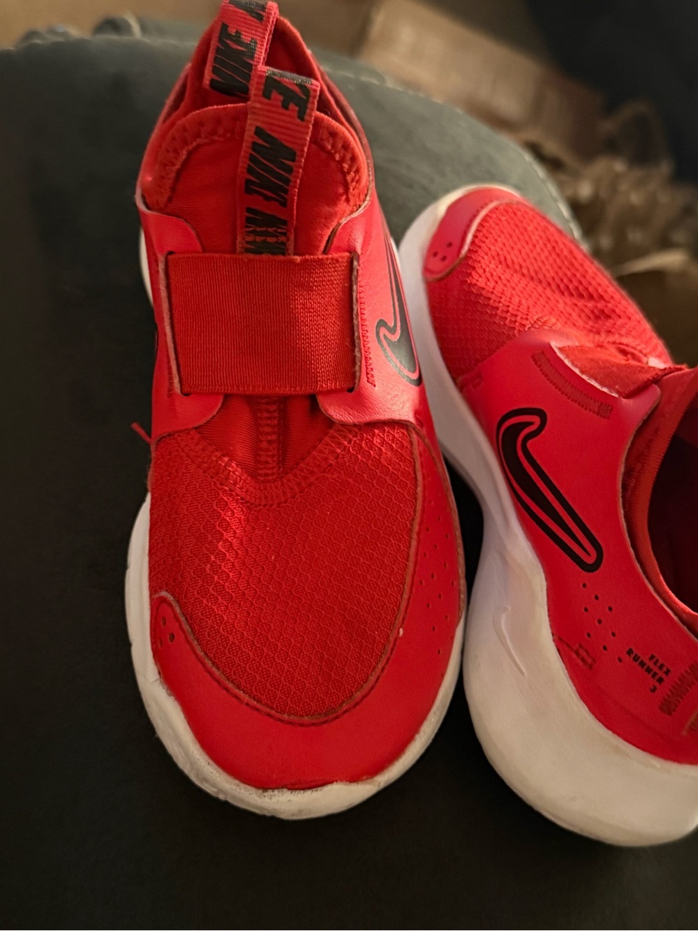 Nike Kids Red Slip-On Sneakers with Black Swoosh